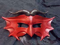 Cheek fans flared, this immense creature looms with a watchful eye.